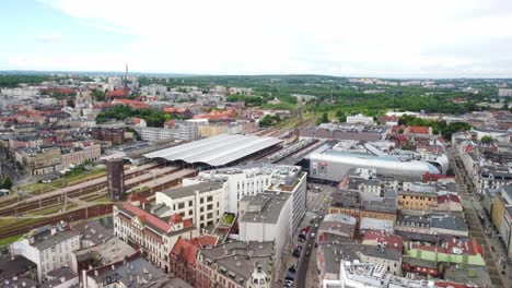 Cityscape-With-Train-Station-In-Katowice,-Poland---Aerial-Drone-Shot