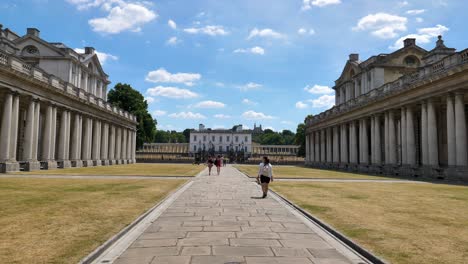 A-view-down-the-courtyard-of-the-Old-Royal-Naval-College-leading-to-the-Queen's-House-on-a-sunny-day,-Greenwich,-London,-UK,-July-2023