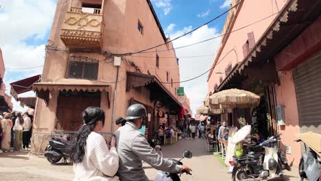 Old-town-medina-street-of-Marrakech-Morocco-busy-market-with-tourists