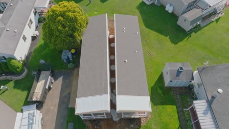 An-Aerial-View-of-a-Manufactured,-Mobile,-Prefab-Double-Wide-Home-Being-Installed-in-a-Lot-in-a-Park