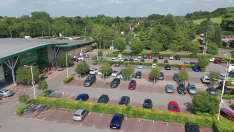 Vehicles-In-The-Parking-Lot-Of-Trentham-Shopping-Village-In-Stoke-on-Trent,-England,-UK