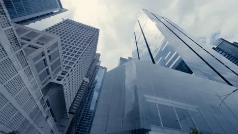 Abstract-slow-motion-looking-up-driving-through-the-business-district-in-Singapore