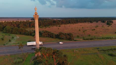 Towering-Elveden-War-Memorial-At-Sunset-In-Suffolk,-East-Anglia,-England,-UK