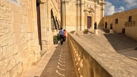 Walking-along-the-historical-site-at-the-Citadel-in-Gozo,-Malta,-capturing-the-rich-cultural-heritage-and-ancient-architecture