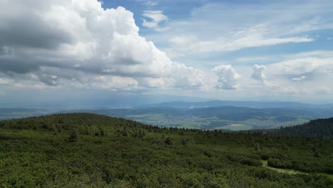 Aerial-view-of-Beskid-mountains-durring-cloudy-day---drone-4K