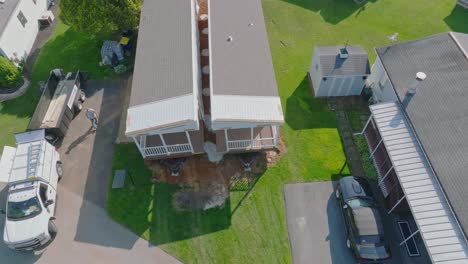 An-Aerial-View-of-a-Manufactured,-Mobile,-Prefab-Double-Wide-Home-Being-Installed-in-a-Lot-in-a-Park