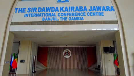 Portrait-of-former-president-Sir-Dawda-Kairaba-Jawara-at-entrance-of-SDKJ-Conference-Centre-in-Bijilo,-The-Gambia