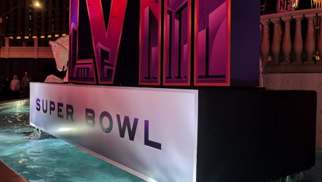 LVIII-Las-Vegas-Super-Bowl-Sign-at-Night-in-Front-of-Caesar-Palace-Hotel-Casino-on-Strip