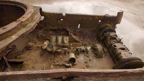 Side-on-wide-shot-of-the-tank-on-the-beach