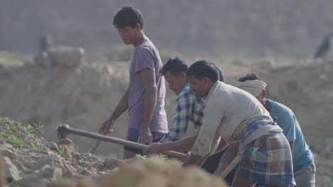 group-of-people-working-in-the-village-cooperating-with-each-other