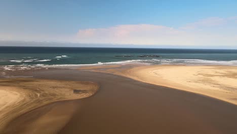 Serene-lagoon,-tranquil-sea,-stunning-coastal-beauty-and-breathtaking-views---Drone-footage-of-Kei-Mouth,-South-Africa