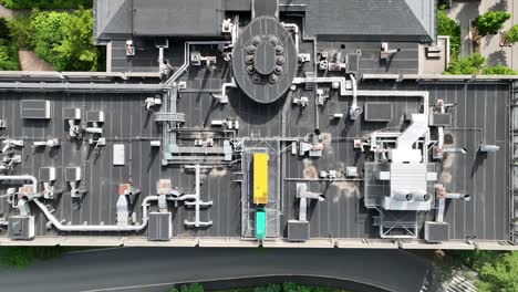 Drone-high-angle-overview-of-HVAC-ventilation-system-on-roof-top