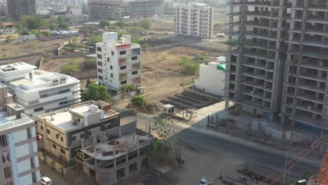 The-drone-camera-shows-many-large-tenement-houses-and-a-large-school