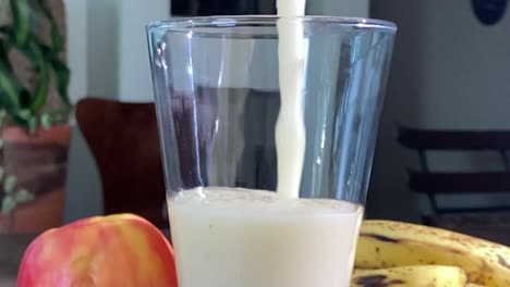 Pouring-natural-liquid-drink,-healthy-organic-fruity-diet,-slow-motion