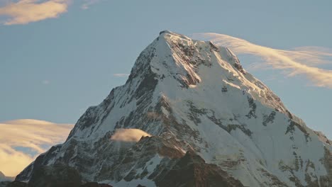 Nepal-Mountains-High-Summit-at-Sunrise-in-Himalayas,-Snowcapped-Mountain-Top,-Winter-Mountain-Close-Up-Peak-in-Beautiful-Dramatic-Glden-Hour-Sunlight-in-Snowy-Snow-Covered-Landscape-Scenery