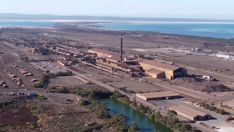 Drone-view-of-the-GFG-Alliance-Whyalla-Steelworks-and-harbor-on-the-Spencer-Gulf,-South-Australia