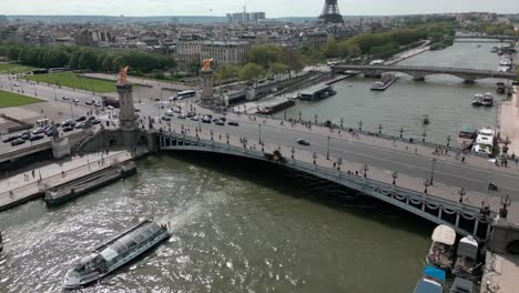 Pont-Alexandre-III-bridge-crossing-Seine-river-in-Paris,-France