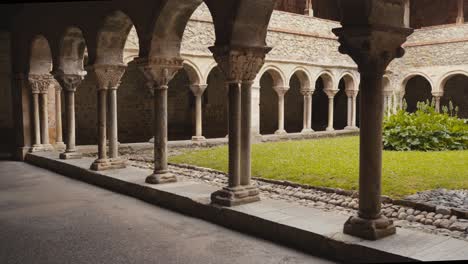 Tall-and-steadfast,-pillars-rise-like-ancient-sentinels,-carved-from-stone