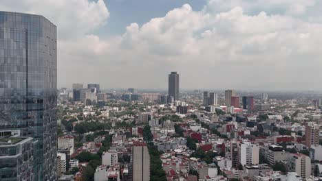 Mexico-City-from-a-drone,-cloudy-sky-day