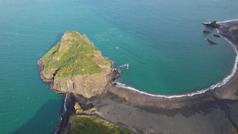 Ninepin-Rock-Formation-At-Whatipu-Beach-In-Auckland,-New-Zealand---Aerial-Shot