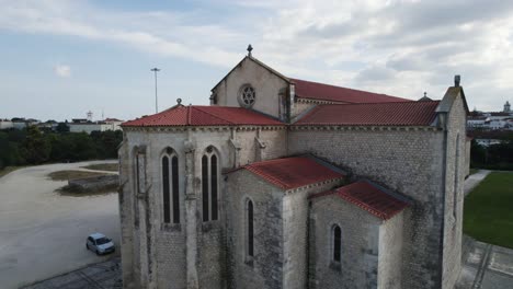 Igreja-de-santa-clara-in-santarém,-portugal-on-a-partly-cloudy-day,-aerial-view