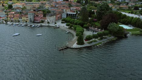 Aerial-pan-of-Pella,-Italian-town-on-Lake-Orta-in-Piedmont-region,-Italy