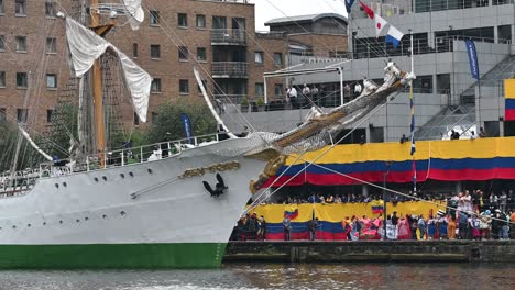 Dancing-outside-of-the-ARC-Gloria-in-Canary-Wharf-to-Celebrate-it-just-arriving,-London,-United-Kingdom