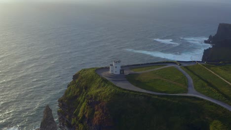 Aerial-view-of-O'Brien's-tower-and-the-sea-at-the-Cliffs-of-Mother