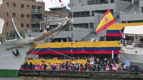 The-Spanish-Juan-Sebastián-de-Elcano-and-Colombian-ARC-Gloria-in-Canary-Wharf,-London,-United-Kingdom