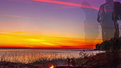 Timelapse-of-a-group-of-young-people-on-the-beach,-bbq-and-enjoying-the-sunset-with-incredible-colors-on-the-sky