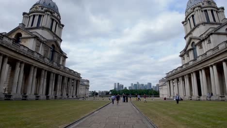 Greenwich,-London:-Girls-running-along-the-paths-of-Greenwich-Palace-at-the-University-of-Greenwich,-enjoying-the-scenic-surroundings-and-historic-ambiance