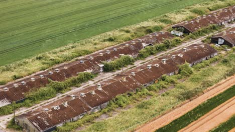 Historic-royal-air-force-facility,-desolate-storage-complex-buildings-in-Bradwell