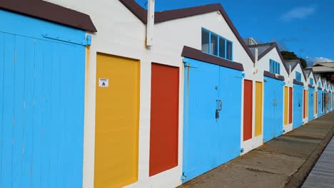 Iconic-boat-sheds-with-vivid-bright-colours-along-Oriental-Bay-waterfront-in-Wellington,-New-Zealand-Aotearoa