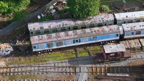 Northamptonshire-Ironstone-railway-trust-aerial-view-over-disused-train-carriages-on-locomotives