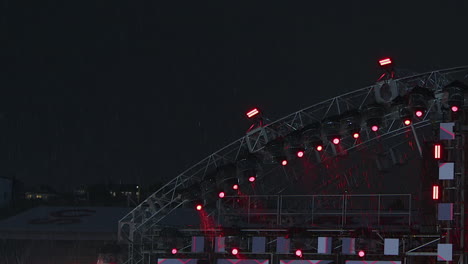 Lightning-and-rain-on-empty-Calgary-Stampede-Grandstand-stage-at-night