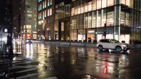 Shot-of-business-and-commerce-complex-on-5th-Avenue-in-New-York-during-a-rainy-night