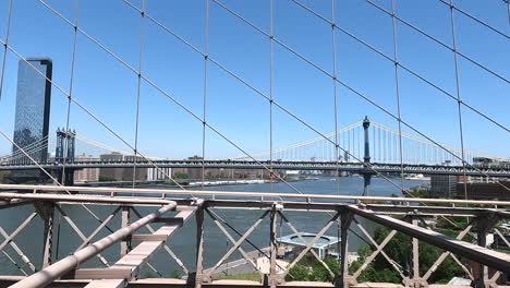 View-of-Manhattan-Bridge-on-the-East-River-on-a-Brooklyn-Bridge-in-New-York-City