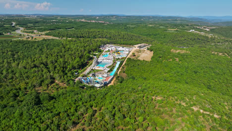 Aerial-view-away-from-the-Aquapark-Istralandia-water-park,-in-sunny-Istria,-Croatia