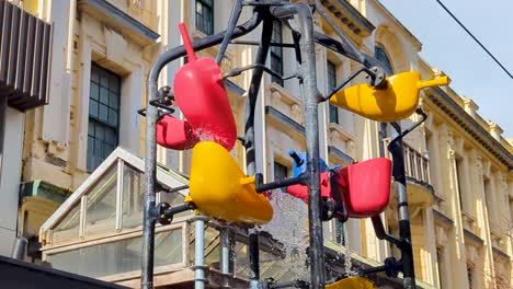 Close-up-of-iconic-bucket-water-fountain-in-Cuba-Mall-on-Cuba-Street-in-city-centre-of-Wellington,-New-Zealand-Aotearoa