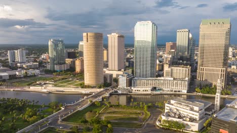 Aerial-hyper-lapse-of-Tampa,-Florida-skyline-during-golden-hour-sunset