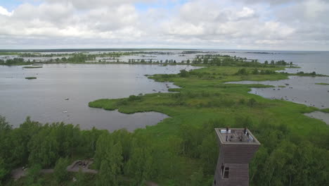 Drone-flying-over-the-historical-Saltkaret-Observation-Tower,-Mustasaari