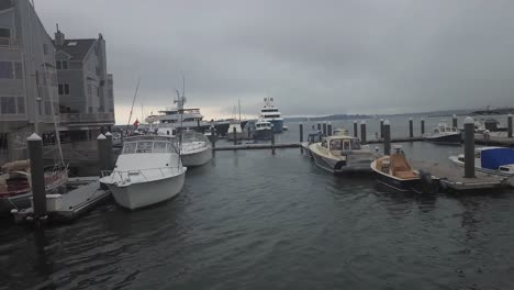 Boats-moored-at-Portland,-maine--luxery-condos