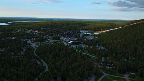 Drone-shot-approaching-of-the-Levi-village,-summer-evening-in-Lapland,-Finland