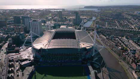 Cardiff-city-Millennium-stadium-establishing-aerial-view-over-Welsh-capital-cityscape