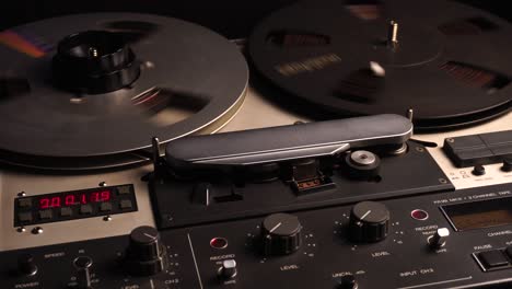 Professional-ReVox-Studio-Audio-Recorder-and-Spinning-Reel-to-Reel-Tape,-Close-Up