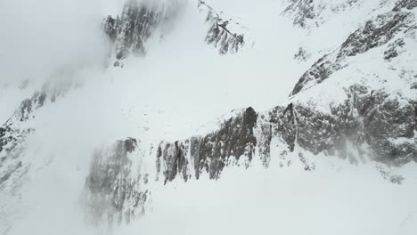 Aerial-View-of-Snow-Capped-Hills-and-Peaks-of-Austrian-Alps-in-Winter-Season