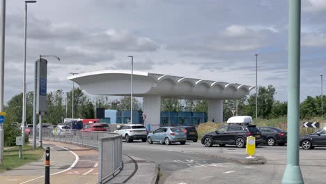 Reveal-of-the-toll-booths-at-Tamar-Bridge-in-Plymouth-Devon-UK,-July-2024