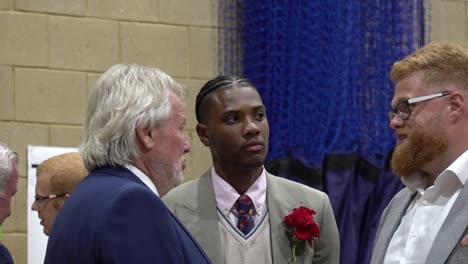 Labour-candidate-Jovan-Owusu-Nepaul-waits-with-Conservative-MP-Giles-Watling-to-hear-the-results-of-the-general-election-in-Clacton,-Essex,-UK