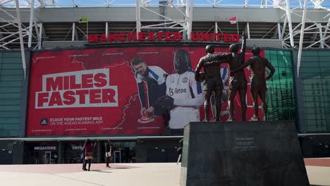 Manchester-United's-United-Trinity-Statue-At-Old-Trafford-Stadium's-East-Stand-In-UK,-static-shot