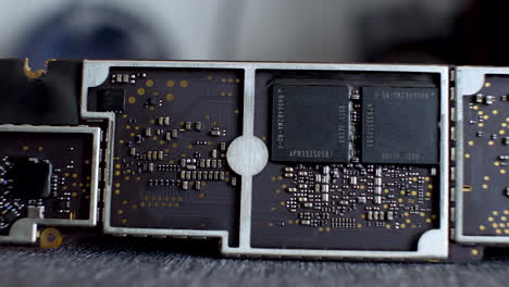 Close-up-of-a-computer-circuit-board,-revealing-intricate-microchips-and-processors-powering-electronic-devices